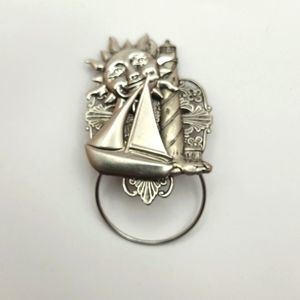 Vintage silver tone fun Sun boat lighthouse brooch